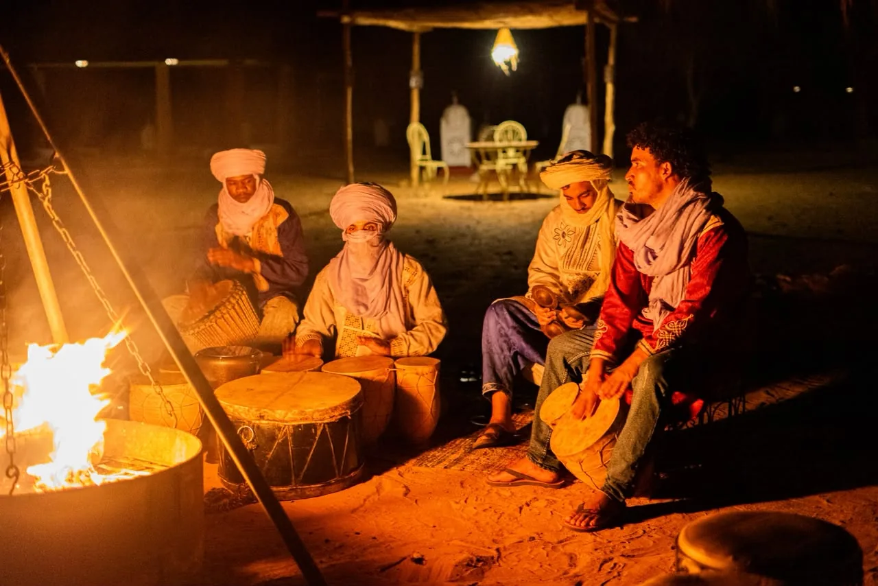 Berber music performance around the campfire at Tassili camp in Merzouga